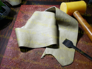 Work-in-Progress Shoulder Strap Hole Punches